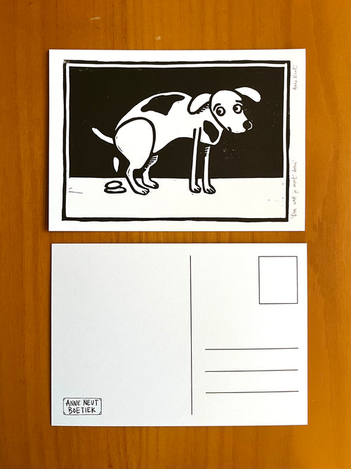 kaart met linoprint van poepende hond door Anne Neuteboom cabaretier Anne Neut Boetiek