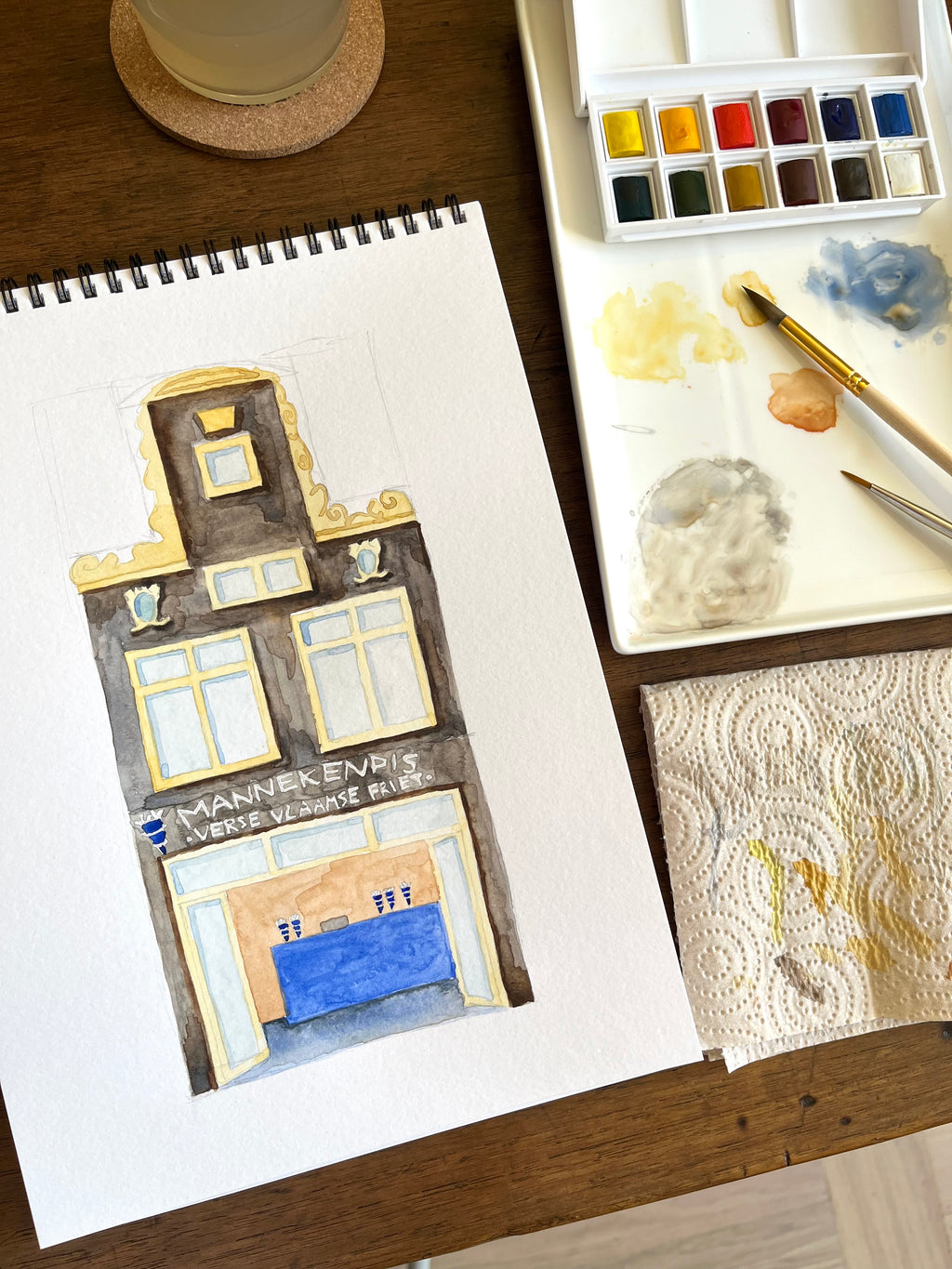 Fine art print van een aquarel van snackbar Mannekenpis in Amsterdam. Geschilderd door Anne Neuteboom, cabaretier. Anne Neut Boetiek.