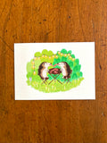 Fine art print van een tekening van twee egels die aan het picknicken zijn en samen een worm eten. Getekend door Anne Neuteboom cabaretier Anne Neut Boetiek.