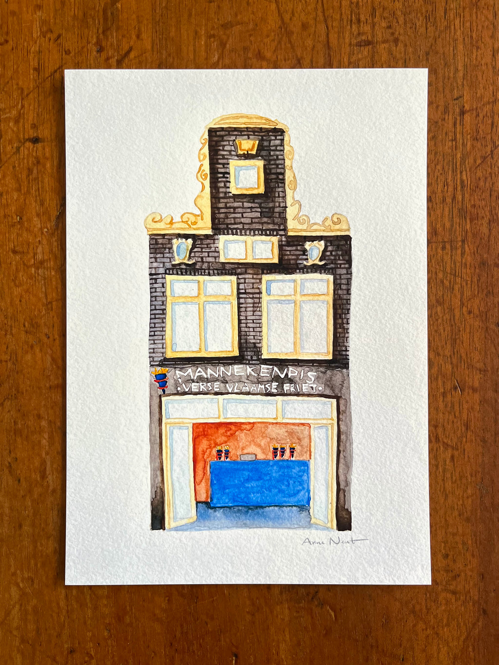 Fine art print van een aquarel van snackbar Mannekenpis in Amsterdam. Geschilderd door Anne Neuteboom, cabaretier. Anne Neut Boetiek.