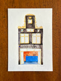 Fine art print van een aquarel van snackbar Mannekenpis in Amsterdam. Geschilderd door Anne Neuteboom, cabaretier. Anne Neut Boetiek.