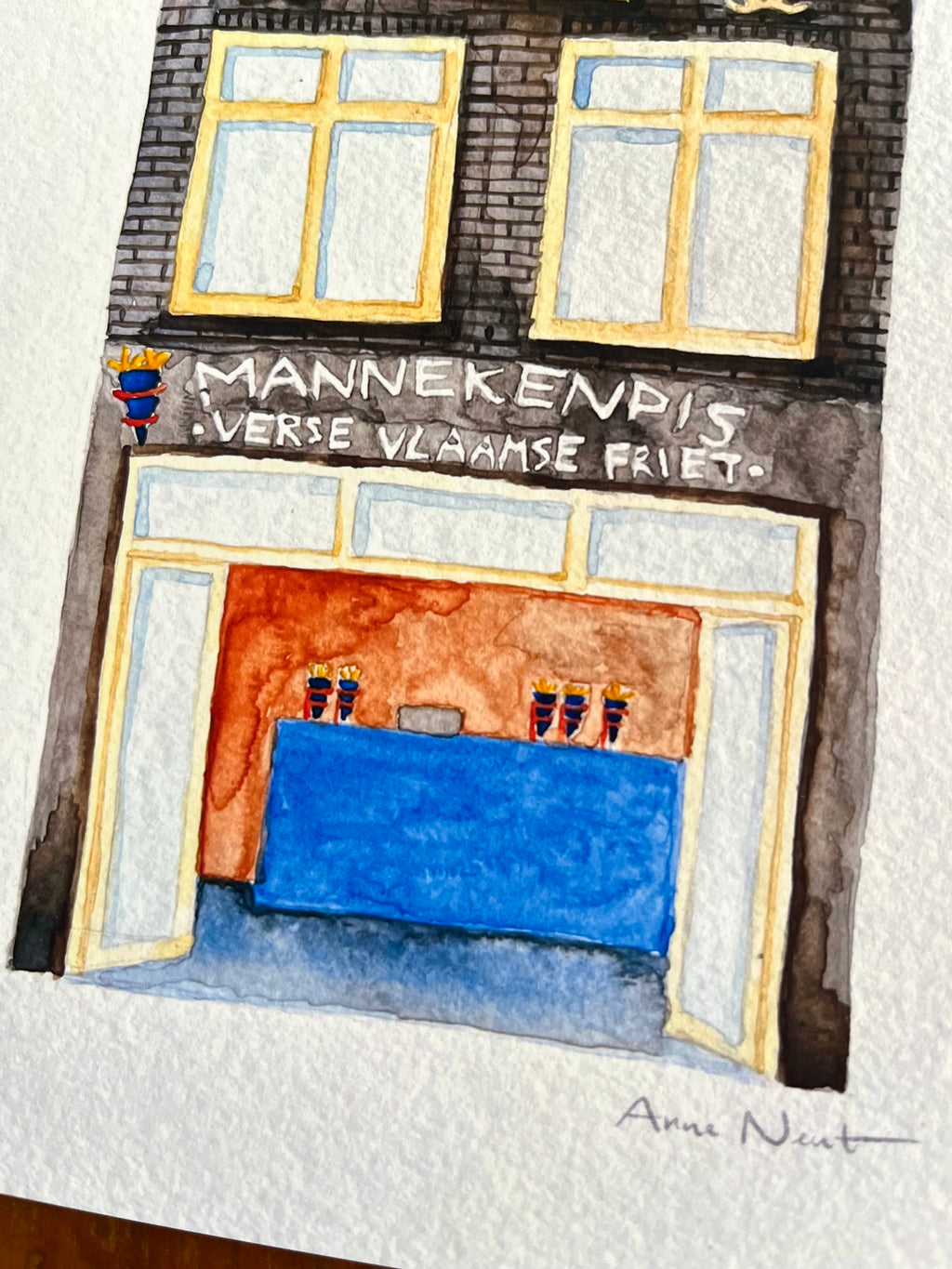 Fine art print van een aquarel van snackbar Mannekenpis in Amsterdam. Geschilderd door Anne Neuteboom, cabaretier. Anne Neut Boetiek.
