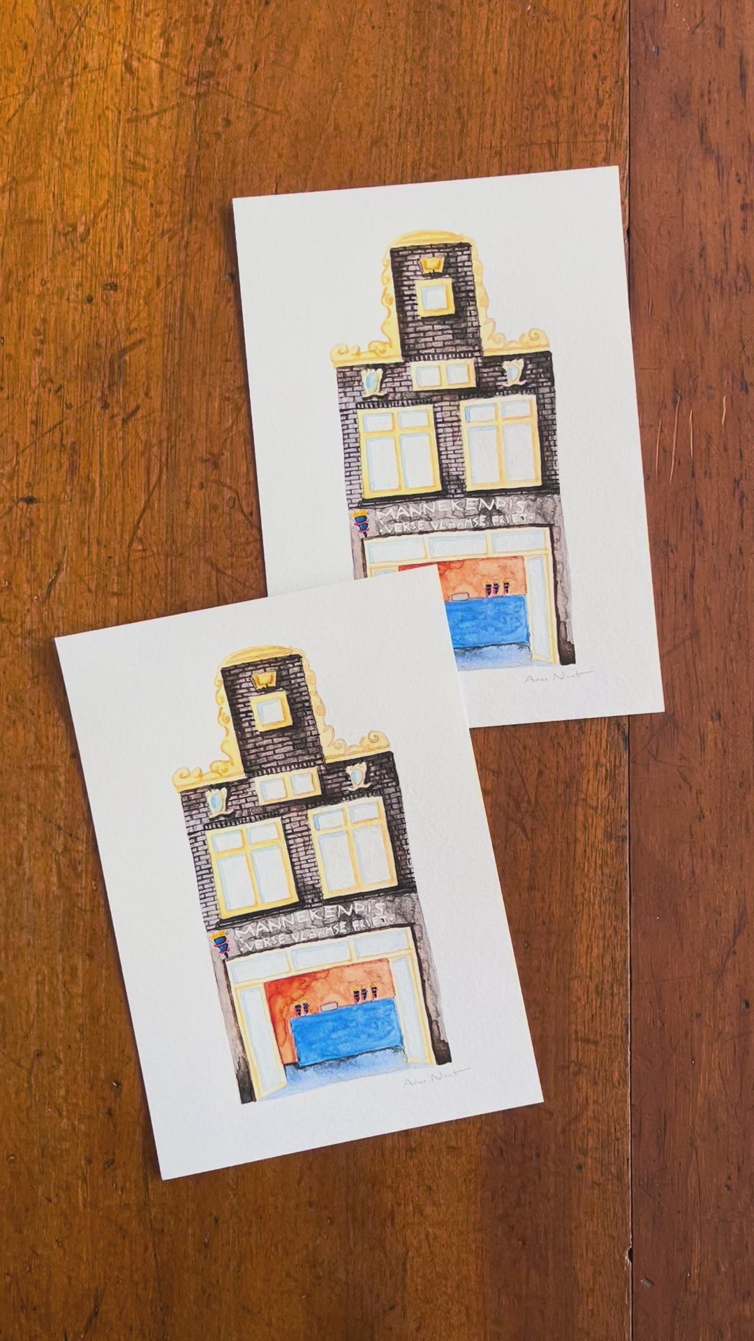 Fine art print van een aquarel van snackbar Mannekenpis in Amsterdam. Geschilderd door Anne Neuteboom, cabaretier. Anne Neut Boetiek.