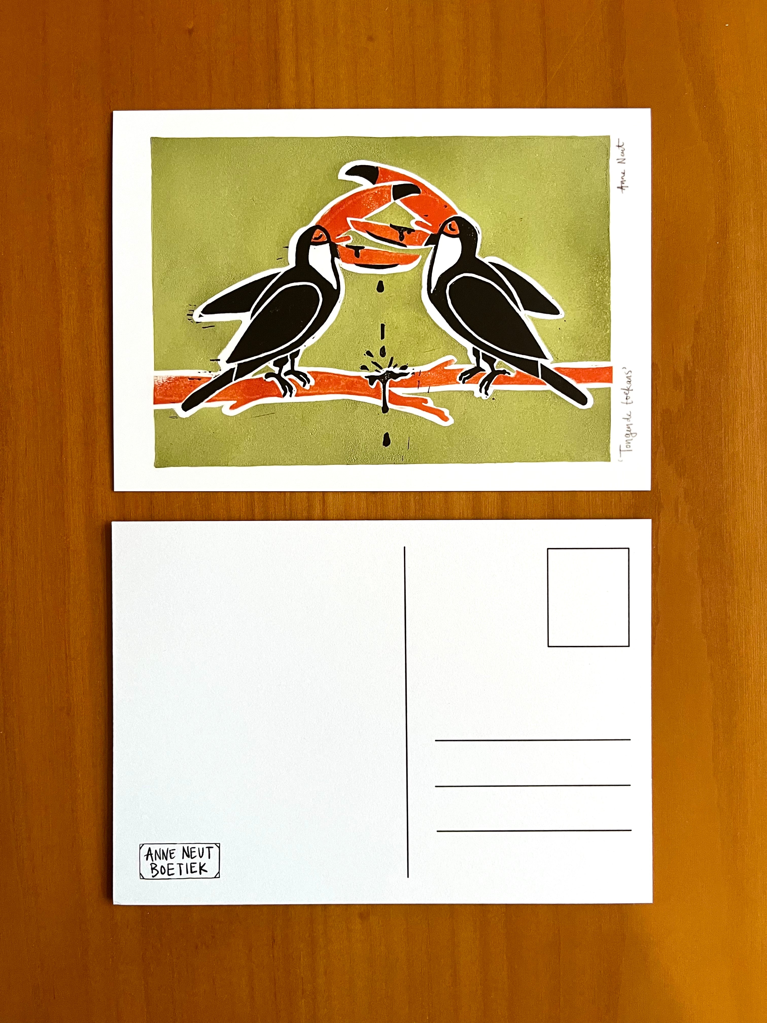 Ansichtkaart met linoprint van tongende toekans door Anne Neuteboom cabaretier Anne Neut Boetiek
